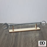 Holder for stock chisel and combination spanner