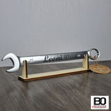 Holder for stock chisel and combination spanner