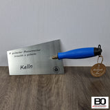 Mason's trowel with various sayings